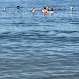 Before dinner, people went down a walkway in Isola de Pellestrina and found a lovely little sandy beach leading into the waters of the Gulf of Venice. With summer temps near record levels, it was a nice respite. (photo by Mary S.)