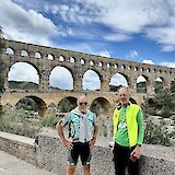 Bob and Pat pausing for a photo in front of the Pont du Gard Roman aqueduct. (photo by Robert Y.)
