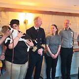 Ships crew and tour guide.  The puppy was a fabulous addition! (photo by Kathie P.)