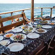 Dining on deck | Panagiota | Bike & Boat Tour