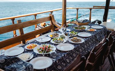 Dining on deck | Panagiota | Bike & Boat Tour