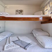 Triple cabin, split level bed | Panagiota | Bike & Boat Tour