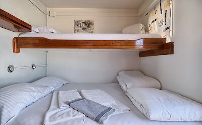 Triple cabin, split level bed | Panagiota | Bike & Boat Tour