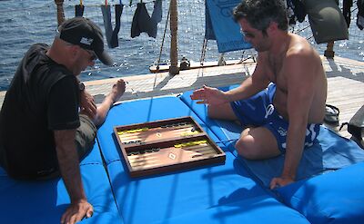 Board game on the sundeck | Panagiota | Bike & Boat Tour