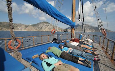 Relaxing on the sundeck of the Panagiota | Bike & Boat Tour