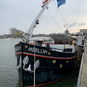 Merlijn docked - Bike & Boat Tours