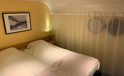 Double bed setting aboard the Merlijn - Bike & Boat Tours