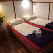 Twin bed cabin with the beds pushed together | Zwaan | Bike & Boat Tours