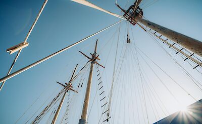 The tall masts of the Thalassa | Bike & Boat Tour