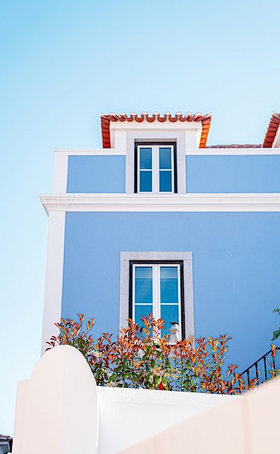 Blue and white building, Cascais, Portugal. Unsplash@Lukas Souza
