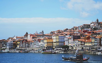 Boats on the Douro River, Porto, Portugal. Unsplash@Eser Degirmencioglu
