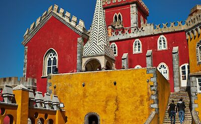 The Romanticist Pena Palace that sits atop Sintra Mountain along the Portuguese Riviera. Flickr:Luca Sartoni