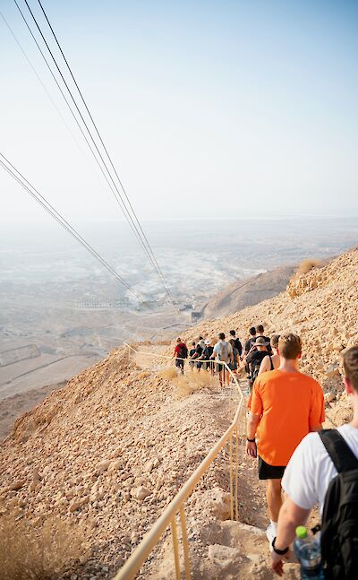 Hiking in Masada, Israel. Unsplash:Peter Pryharski 
