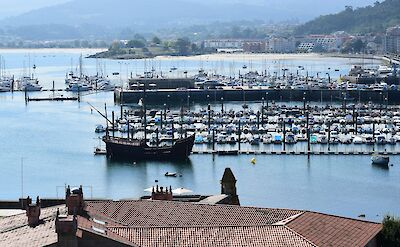 Boats and a ship, Baiona, Spain. Unsplash:Carlos Cantero