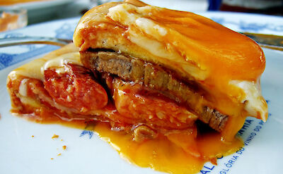 Francesinha, a popular Portuguese sandwich originally from Porto. CC:Filipe Fortes