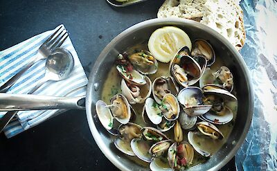 Pan of fresh mussels, Spain. Unsplash:Wikisleep App