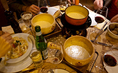 Cheese fondue is a favorite in Switzerland. Flickr:John Mettraux