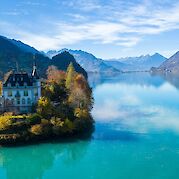 Aare River, from the Swiss Alps to the Rhine - Grand house on the lake in Iseltwald, Switzerland. Unsplash@Manuel Boxler