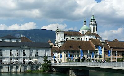 St. Ursus Cathedral and a bridge spanning the Aare River in Solothurn, Switzerland. Unsplash@Stephan hinni