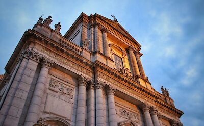 Low-angle view of the neoclassical St. Ursus Cathedral in Solothurn, Switzerland. Unsplash@Martin Zenker