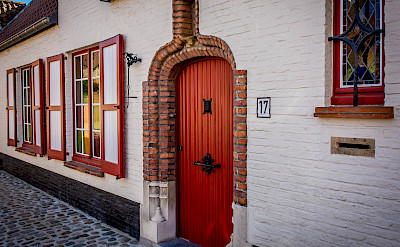 Beautiful facades in Bruges, Belgium. Photo via Flickr:Ron Kroetz