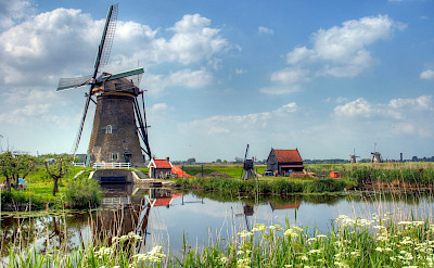 19 windmills make up Kinderdijk, South Holland, the Netherlands. Photo via Flickr:John Morgan