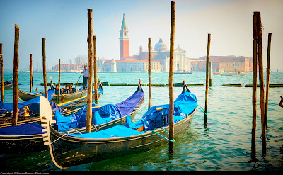 Gondolas await in Venice, Italy. Flickr:Moyan Brenn