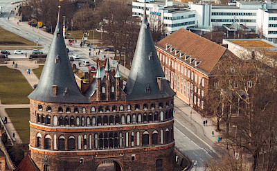 City gate, Lübeck. Photo by Moritz Kindler on Unsplash