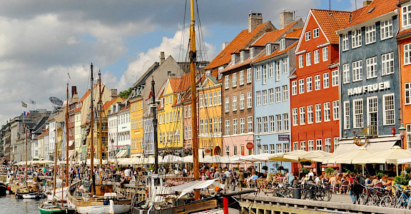Boats in harbor at Nyhavn in Copenhagen, Denmark. Flickr:Dimitris Karagiorgos 55.67523036917366, 12.573921899786916