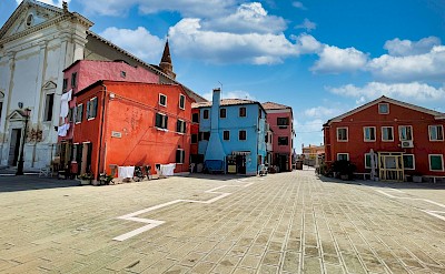 Colorful houses in Pellestrina, Italy. Unsplash@Enzo Mologni