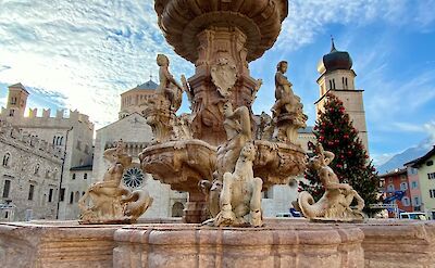The Neptune Fountain in Trento, Italy. Unsplash@Luca