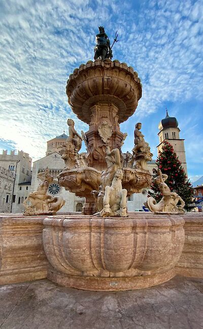 The Neptune Fountain in Trento, Italy. Unsplash@Luca