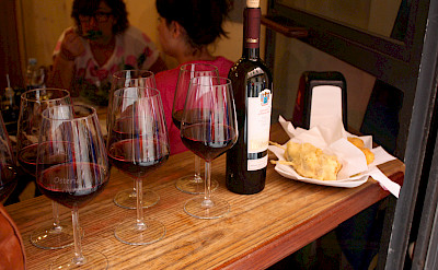 Wine tasting at an osteria. Flickr:Mark Doliner