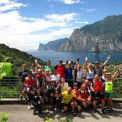 Bolzano to Verona - Group shot at Lake Garda in Italy. ©Photo via TO 45.859296, 10.850958