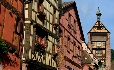 Colorful streets in Riquewihr in Alsace, France. Flickr:Pug Girl