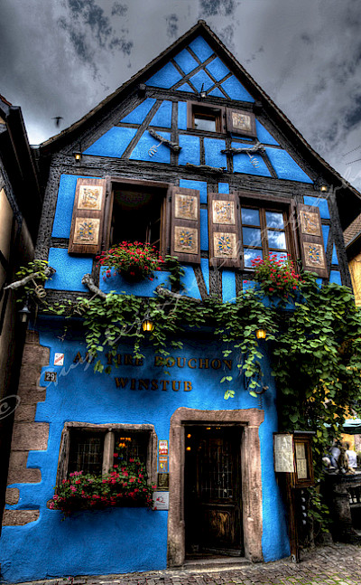 Blue house in Riquewihr, France. Flickr:Guy Lejeune
