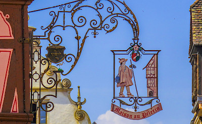 Decorative signs in Colmar, Alsace, France. Flickr:Kiefer