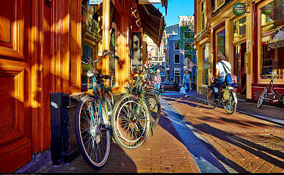 Biking through Amsterdam, North Holland, the Netherlands. Flickr:Moyan Brenn