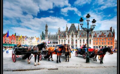 Horse-drawn carriages in Bruges, Belgium. Flickr:Wolfgang Staudt