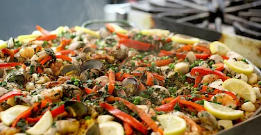 Seafood paella to help fuel your bike ride! Photo via Flickr:Mccun934