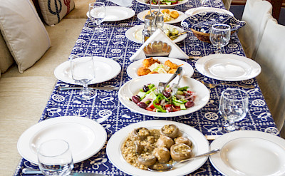 Traditional Greek food on board the Panagiota, Cyclades Islands bike tour.