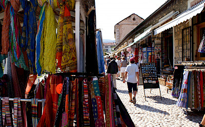 Shopping in Mostar in Bosnia-Herzegovina. Photo via Flickr:Pero Kvrzica