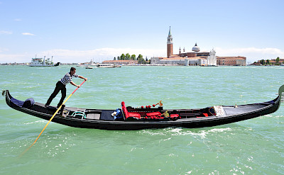 Gondolas await in Venice, Italy.