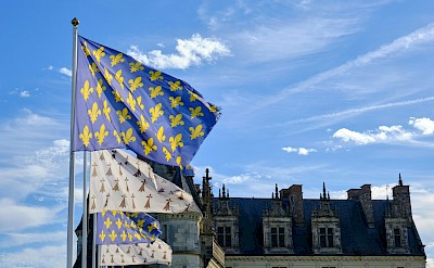 Flags in Amboise, France. Unsplash@Pierre Antona