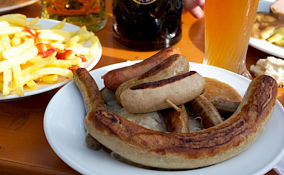 Sausages and beer in Munich, Bavaria, Germany. Photo via Flickr:junseita
