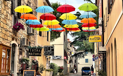 Umbrellas in Novigrad, Istria, Croatia. Flickr:aiva.