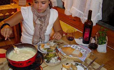 Cheese fondue is a favorite in Switzerland. Flickr:Luis Beltran