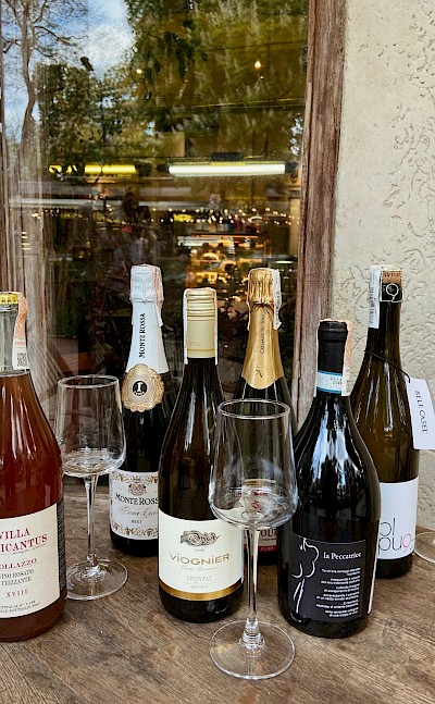 An inviting wine tasting at a local French wine shop. pexels@katerina