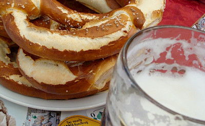 Pretzels and beer in Munich, Bavaria, Germany. Flickr:Iness