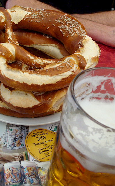 Pretzels and beer in Munich, Bavaria, Germany. Flickr:Iness